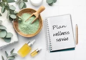 over head view of notebook to plan steps to add wellness services